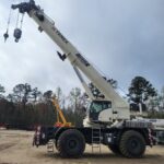 A large 2019 Terex crane on a construction site.