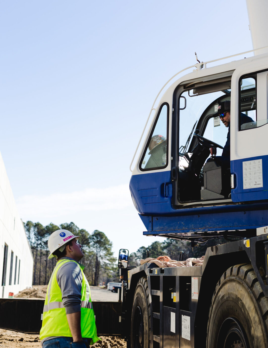 Dozier Cran Employees working together in the crane yard