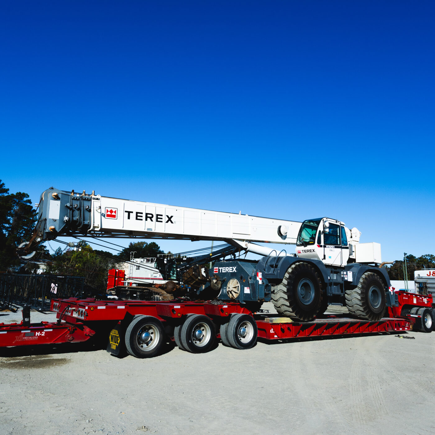 Terex crane pictured on heavy hauling truck bead