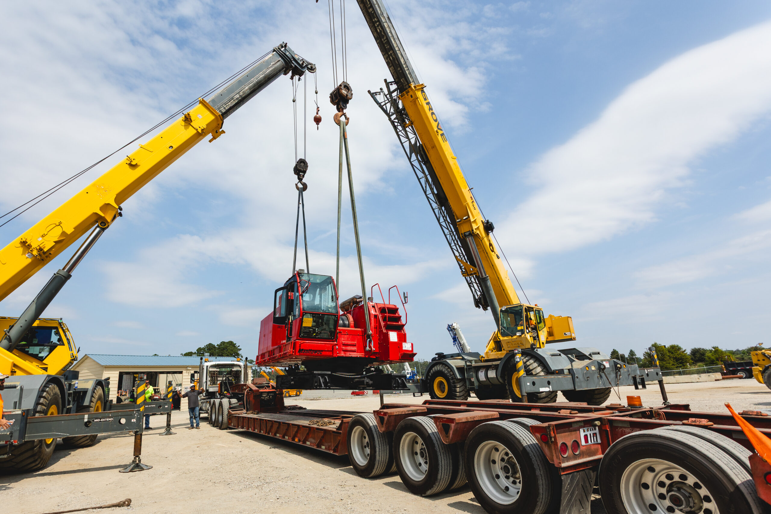 heavy haul manitowoc crane pictured on construction site