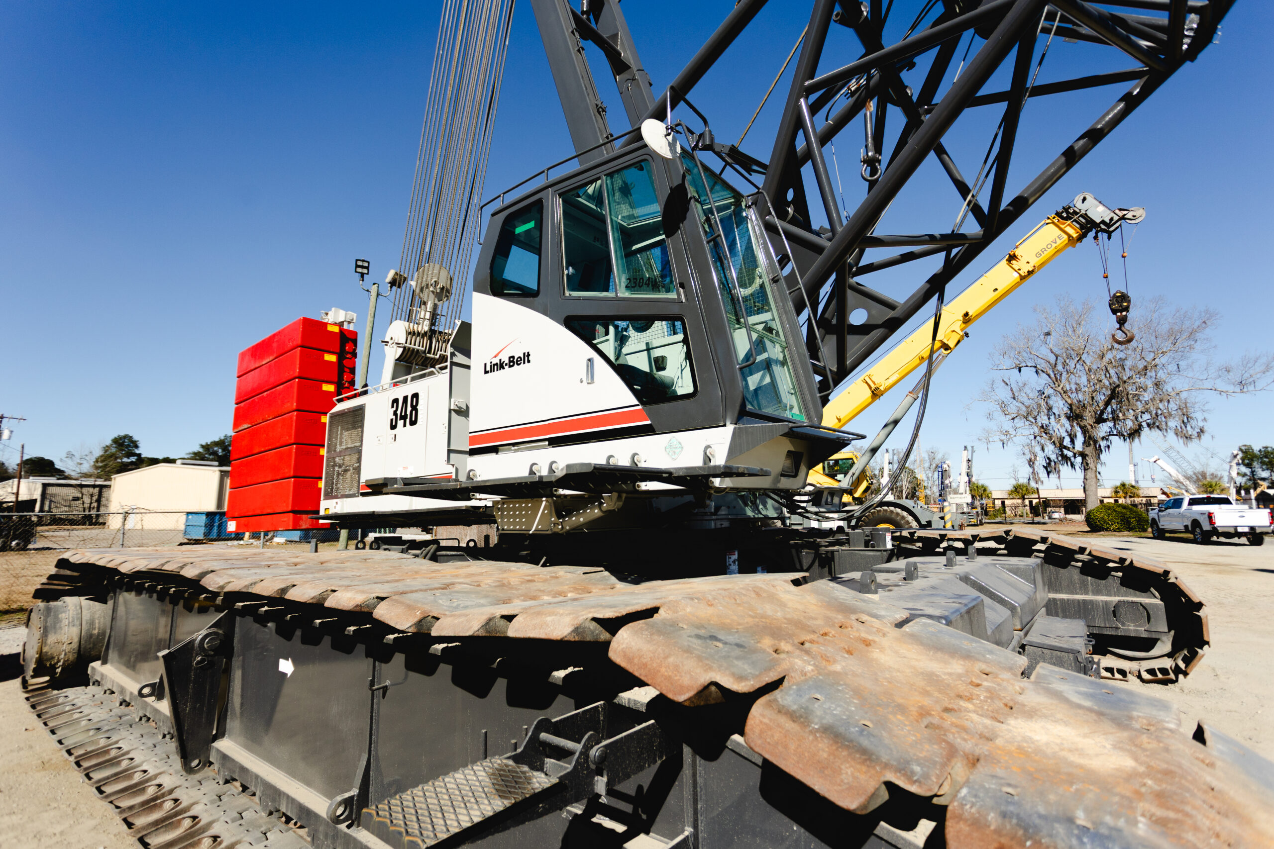 Lattice crawler crane pictured on a construction site