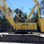 A 2008 Kobelco crane ck-1600II on a construction site.